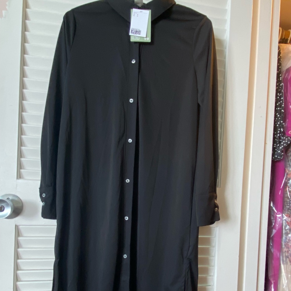 Black dress. MIDI with side slits